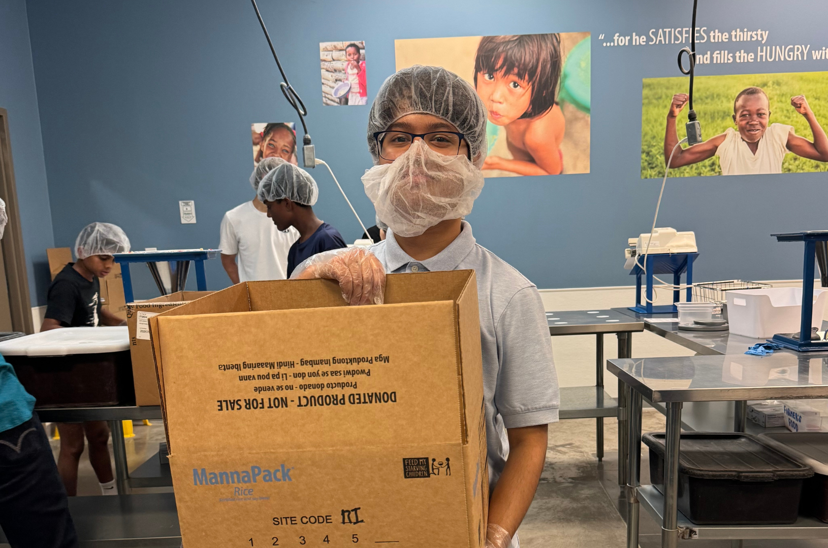 Feed My Starving Children ARGO intern and mentor community service event in our community